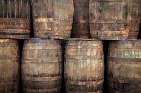 24050478-stacked-pile-of-old-whisky-barrels.jpg